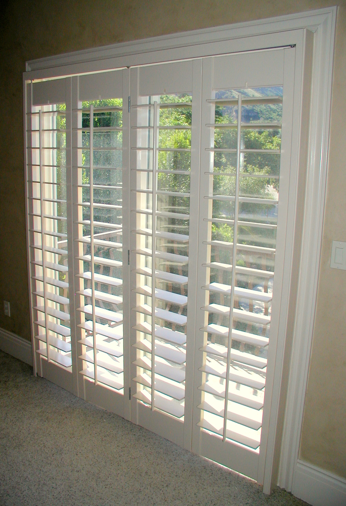 bi-fold shutters for interior side of sliding doors